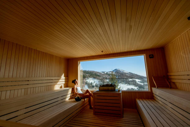 istock Young woman relaxing in the sauna 1392333685