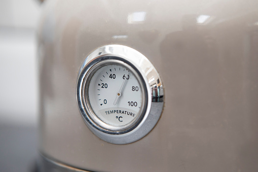 Detail of a temperature gauge on an electric kettle