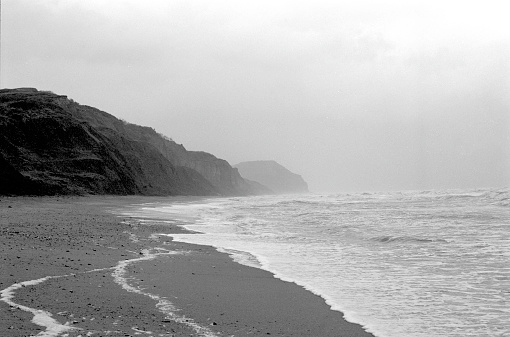 A cold and bleak day on the beach on the Jurassic coast in Dorset, 35mm film.