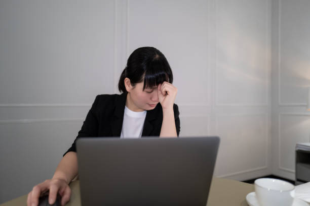 istock A white-collar woman who has trouble at work 1392339592