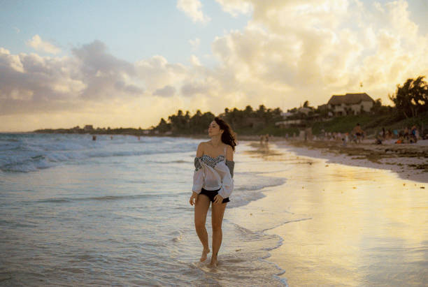 istock Woman     on the beach in Tulum 1392345836