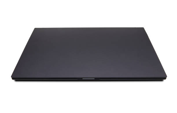 istock Closed laptop isolated on white background 1392347242