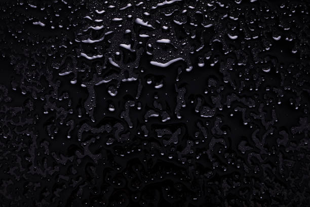istock Close up Drop water on glass floor 1392347268
