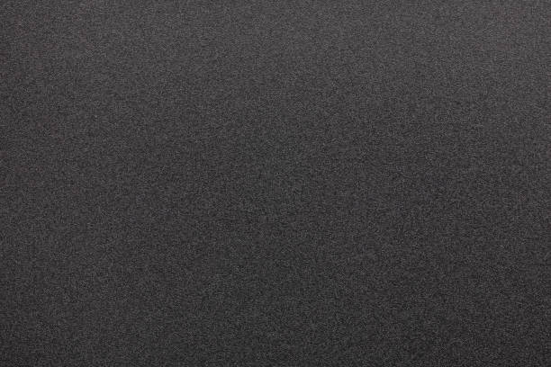 istock Texture of black sponge surface or background. 1392347312