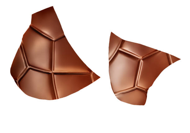 istock Crushed Chocolate pieces isolated on white background. Milk chocolate closeup