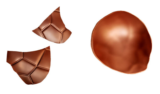 istock Crushed Chocolate pieces isolated on white background. Milk chocolate closeup