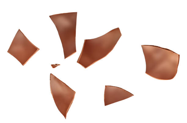 istock Crushed Chocolate pieces isolated on white background. Milk chocolate collection