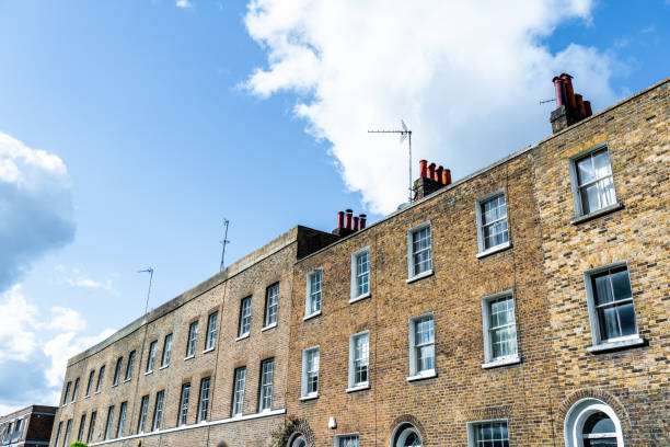 istock Old brick apartment buildings in London 1392350751