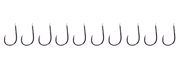 stainless fishing hooks on horizontal white background