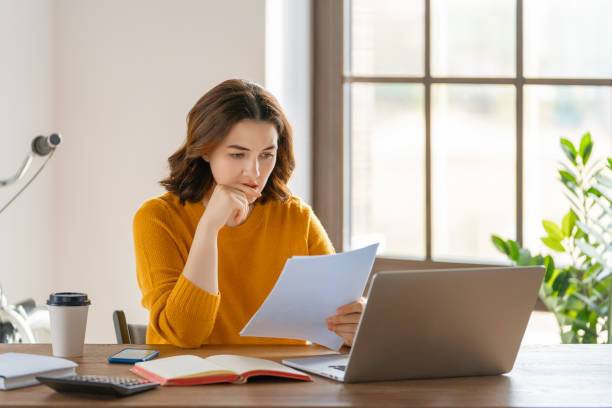 istock woman working in the office 1392353851