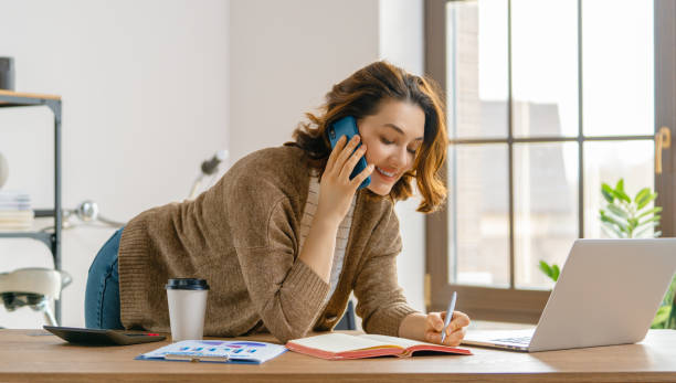 istock woman working in the office 1392353858
