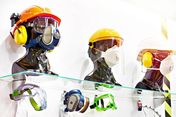 istock Protective helmets and industrial masks with filters 1392356334