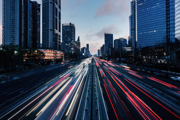 Busy Traffic, Traffic moving in both directions at dusk Busy Traffic, Traffic moving in both directions at dusk / Beijing, China complexity architecture stock pictures, royalty-free photos & images