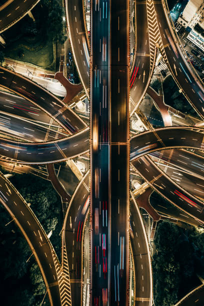 Drone Point View of Overpass and City Traffic at Night stock photo