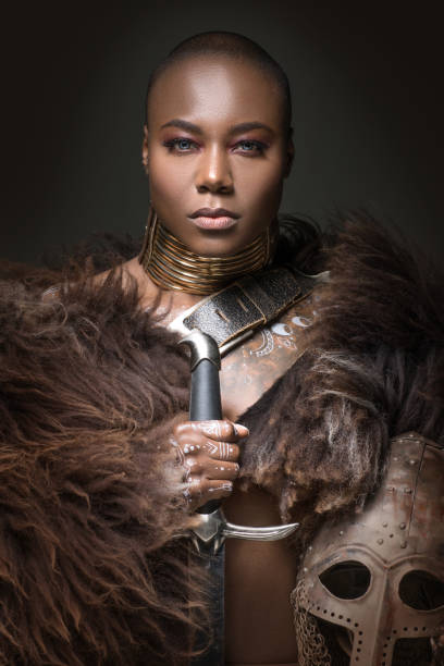 istock Beautiful black viking inspired warrior princess in studio shot 1392356551