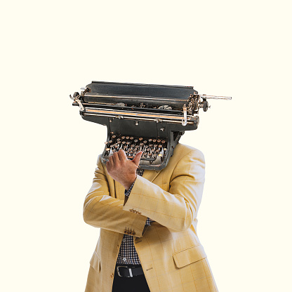 Contemporary art collage. Man in stylish jacket with retro typewriter isolated over yellow background. Creating story. Copy space for ad, text. Concept of old fashion, history, creativity, inspiration