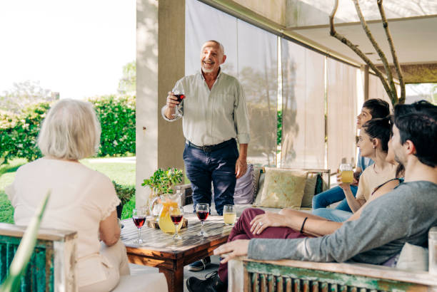 istock Multi-generation family celebrating at patio 1392359202
