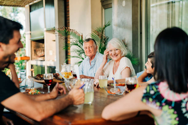 istock Extended family having a party in patio 1392359311