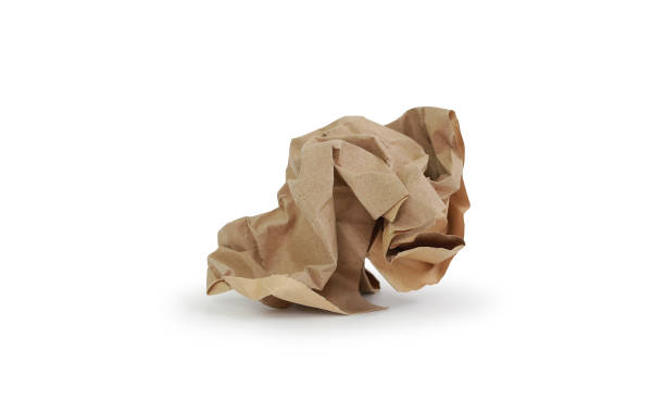 istock Brown crumpled paper isolated on white background. Image with Clipping path 1392359413