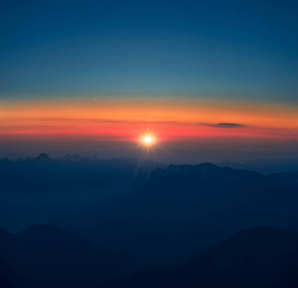 istock Beautiful Sunset in mountains 1392359826