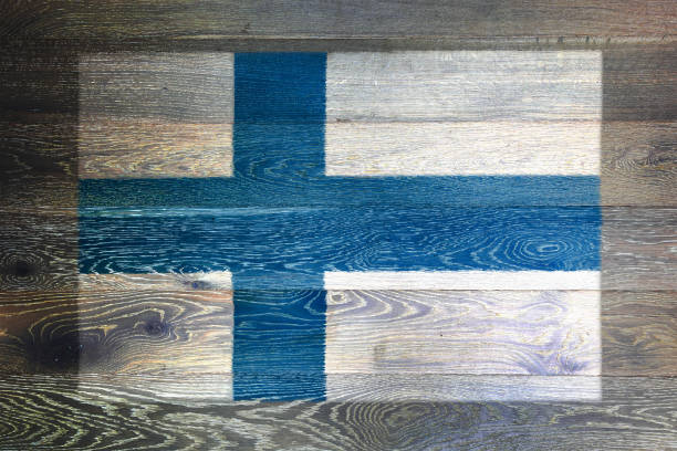 Finland flag on rustic old wood surface background