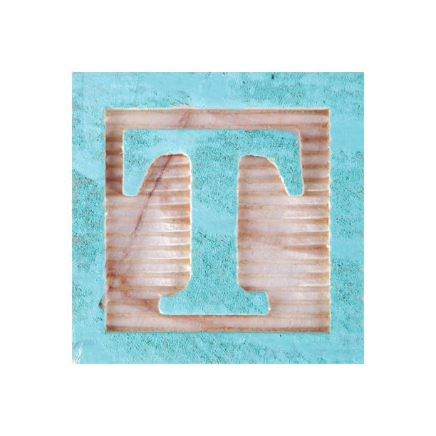 istock Letter T childs wood block on white with clipping path 1392361865
