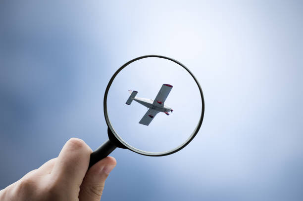 istock Focusing on a light aircraft in the sky 1392363595