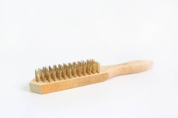 istock Brass wire scratch brushes for metal cleaning in industrial use isolated on white background. 1392363965