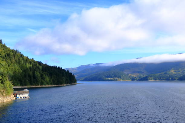 istock Mountain lake in Romania, Bicaz energy dam 1392364067