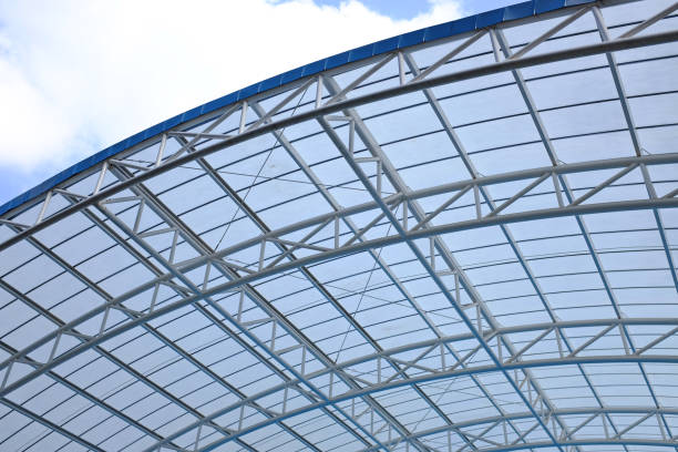 istock Arched roof steel structure design for swimming pool. 1392364930