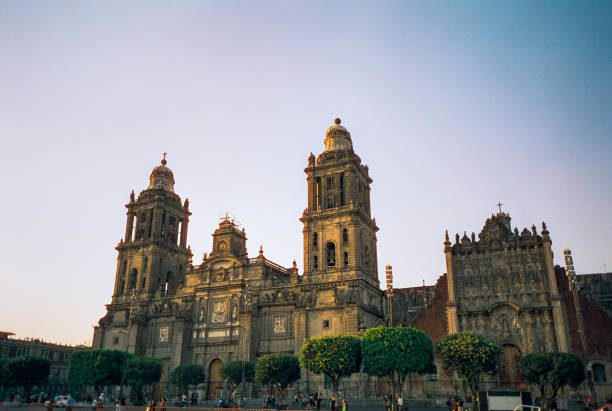 Facade of the historical Metropolitan Cathedral of Mexico City built between 1573 and 1813. Metropolitan Cathedral of the Assumption of the Most Blessed Virgin Mary into Heaven.