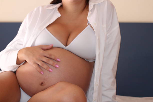 nine month pregnant woman