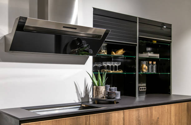 istock Part of a modern kitchen, a place for cooking, extractor and stove. 1392374194