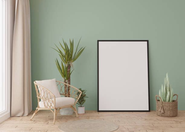 istock Empty vertical picture frame standing on parquet floor in modern living room. Mock up interior in minimalist, scandinavian style. Free space for picture. Plants, rattan basket. 3D rendering. 1392374974