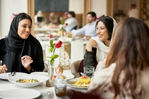 istock Riyadh women in their 20s smiling and talking over lunch 1392375198