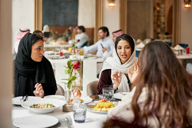 istock Inspired Saudi women sharing ideas over lunch 1392375200