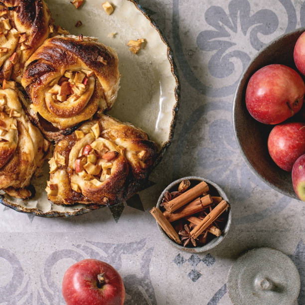 istock Sweet apple cinnamon buns. Traditional home bakery 1392377386