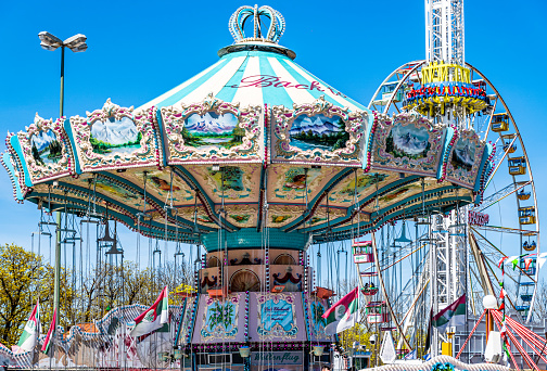 Colorful horse as part of a vintage merry-go-round for children on a playground