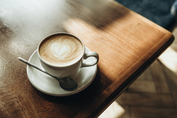 istock A cup of latte on the table 1392380984