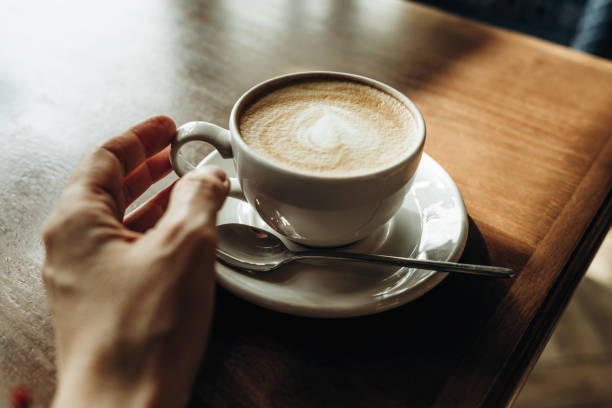 istock A cup of latte on the table 1392380985