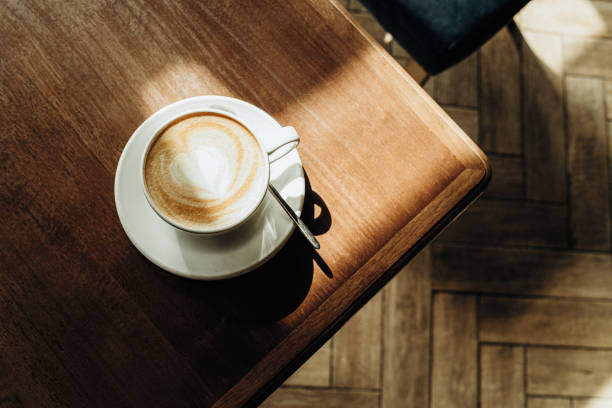 istock A cup of latte on the table 1392380993