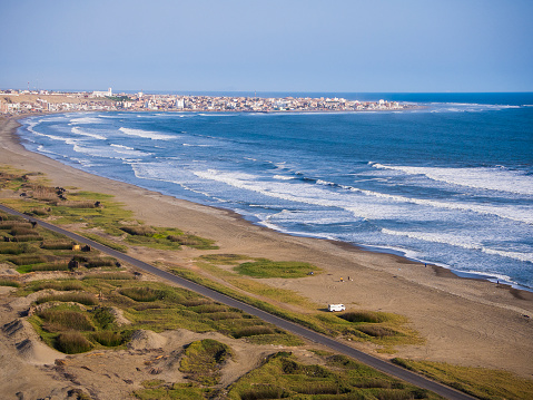 Trujillo, Peru: Aerial view of the coast and the plantation of reeds that are used for the manufacture of Caballitos de totora, small traditional boats from the north of Peru