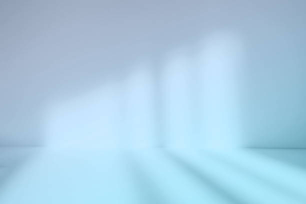istock Abstract blue studio background for product presentation. Empty room with shadows of window. Display product with blurred backdrop. 1392386226