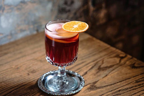 istock red mulled wine decorated with dried orange on the table in the bar 1392387702