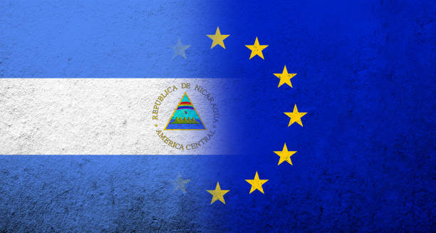 ilustrações, clipart, desenhos animados e ícones de bandeira da união europeia com bandeira nacional da nicarágua. fundo grunge - european union coin illustrations