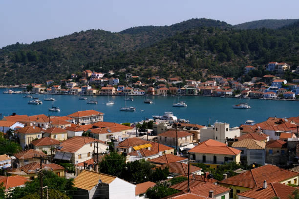 Ithaca, Greece, August 3, 2021. Aerial view of Vathy which is the capital and the main harbour of Ithaca . The village is built amphitheatrical around a deep and sheltered bay with a narrow entrance.