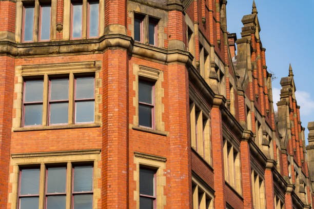 istock Old brick building in English city. 1392400074