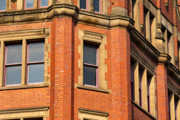 istock Old brick building in English city. 1392400088