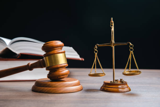 istock scales with judge gavel and law book 1392401207