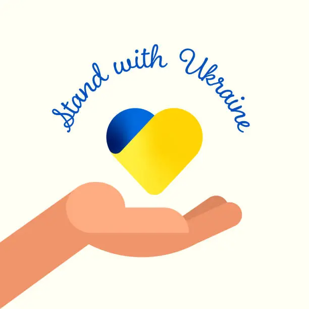 Vector illustration of Stand with Ukraine Concept vector illustration. A Helping Hand Holding a Heart with Ukranian Flag Colors